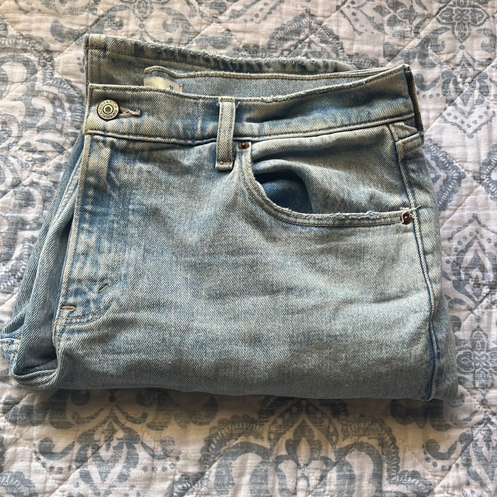 Curve Love Light washed low rise flare jeans